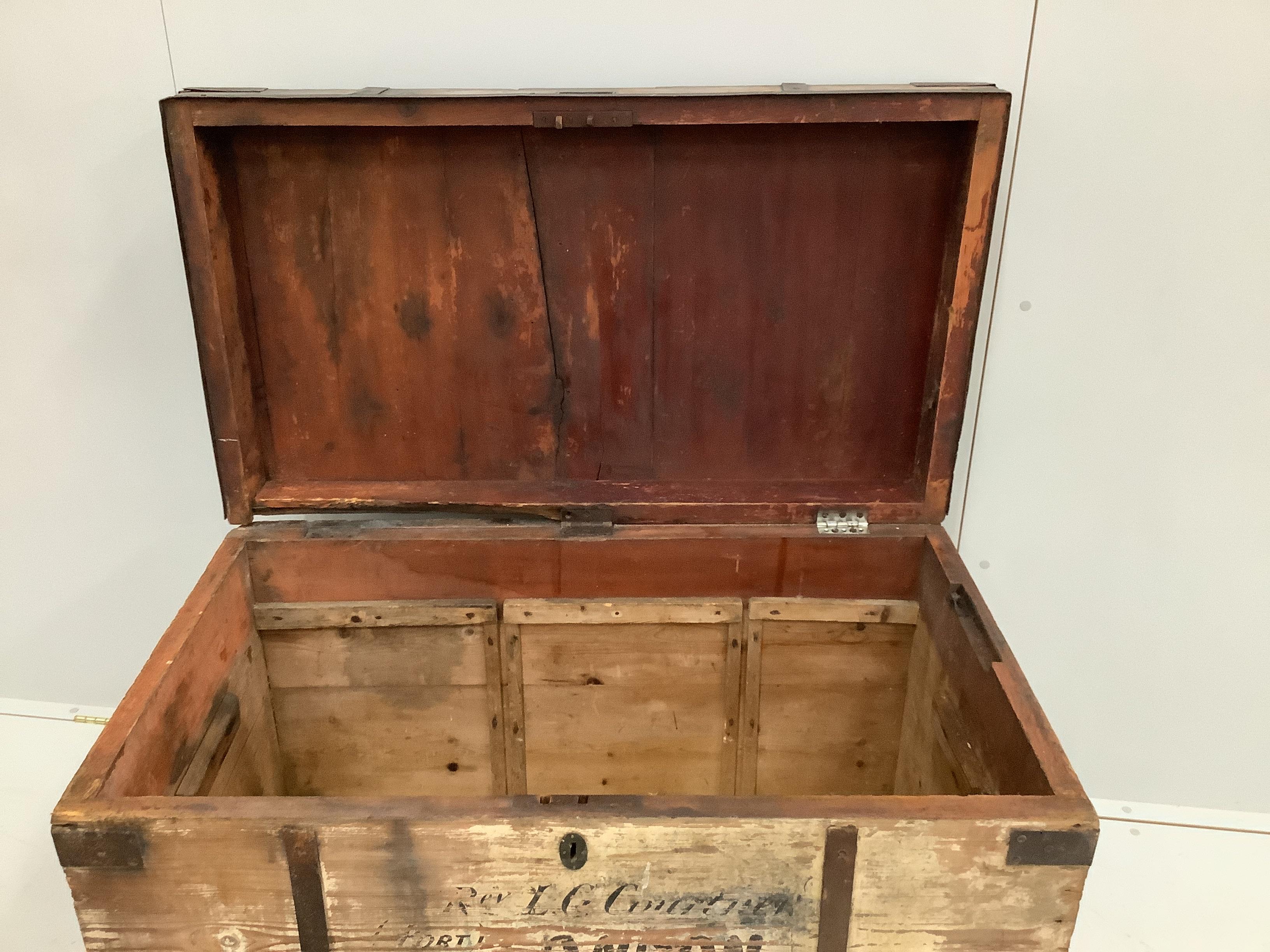 A vintage iron bound pine trunk width 107cm, depth 62cm, height 68cm.